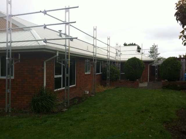 Canterbury Roof Coatings before picture with cream coating